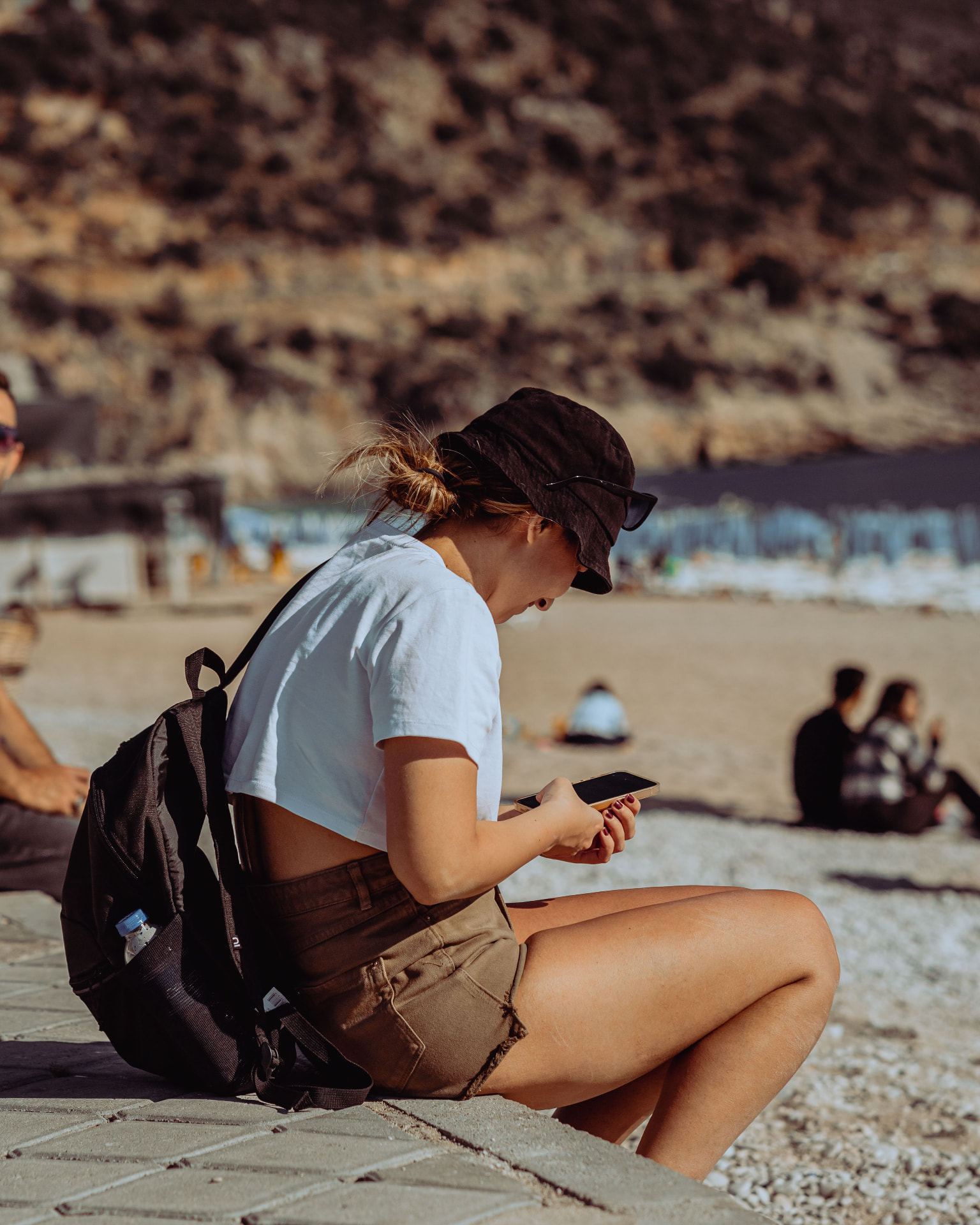 Traveler taking a quiet moment on a Croatian beach